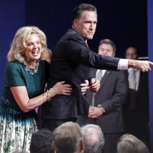 After another good night: Mitt Romney clowning with wife Ann last night as he greets audience members following the last presidential debate.