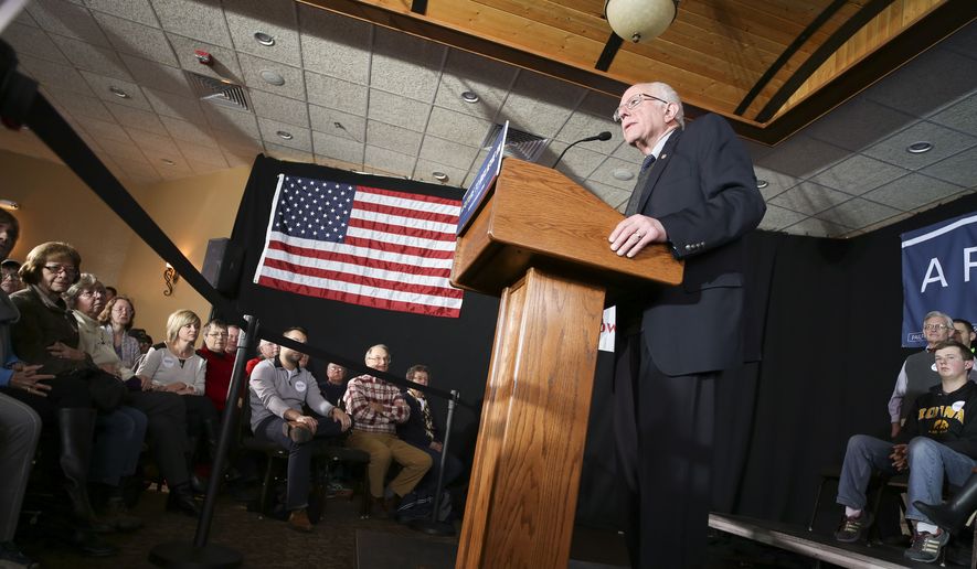 In this photo taken Tuesday, Jan. 19, 2016, Democratic presidential candidate Sen. Bernie Sanders, I-Vt., asks for support during the Feb. 1 Iowa Caucus during a campaign speech at Santa Maria Winery in Carroll, Iowa.  (Jeff Storjohann/Carroll Daily Times Herald via AP) MANDATORY CREDIT