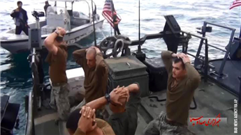 U.S. Navy sailors are detained by Iranian Revolutionary Guards in the Persian Gulf, Iran, as pictured in a frame grab of a video released Tuesday by...
