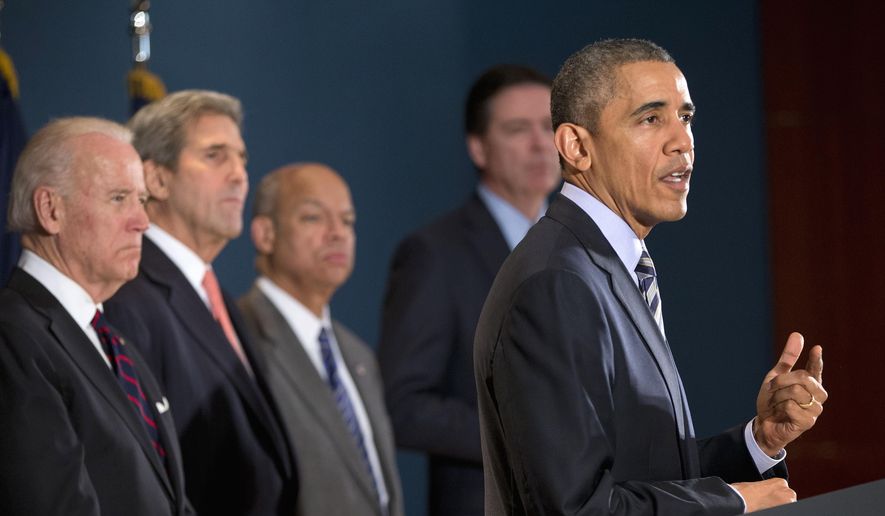 President Barack Obama speaks at the National Counterterrorism Center in McLean, Va., Thursday, Dec. 17, 2015. Joining him, from left are, Vice President Joe Biden, Secretary of State John Kerry, Homeland Security Secretary Jeh Johnson, and FBI Director James Comey. (AP Photo/Pablo Martinez Monsivais)